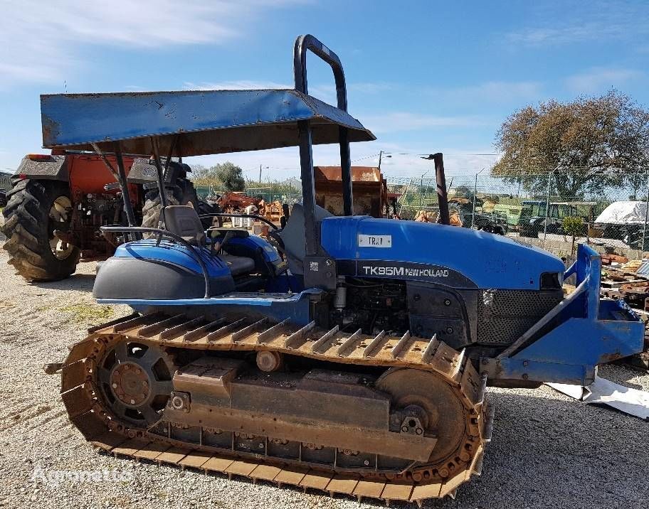 New Holland TK95M traktor guseničar